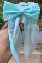Elegant long-tail bow clip with pearls